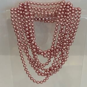 60” of beautiful Pink Pearls this incredible Necklace is so versatile.